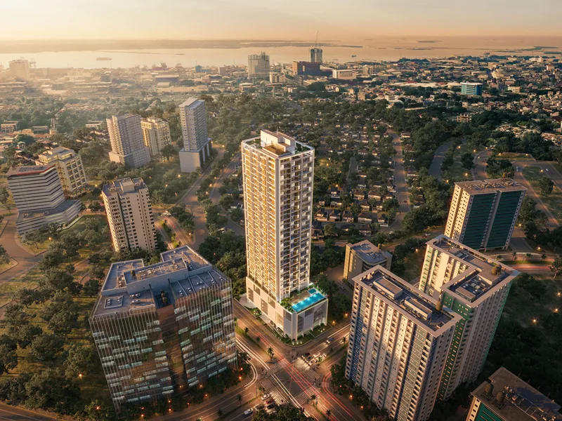 Lucima standing in Cebu Business Park at dusk, photographed from the air.