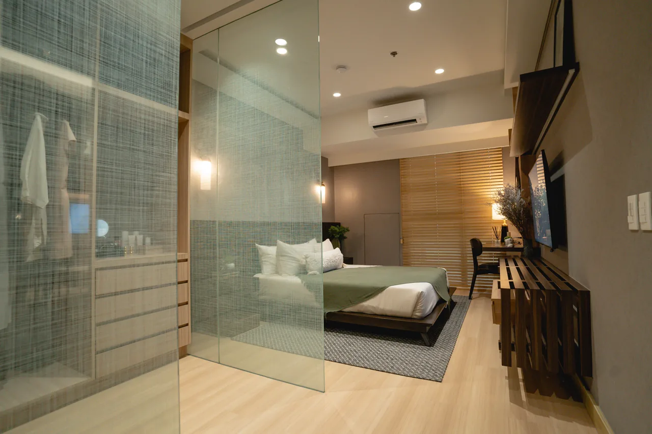 A suite at Lucima with the bedroom open to the living area.